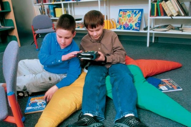 Photos of boys with recorded books